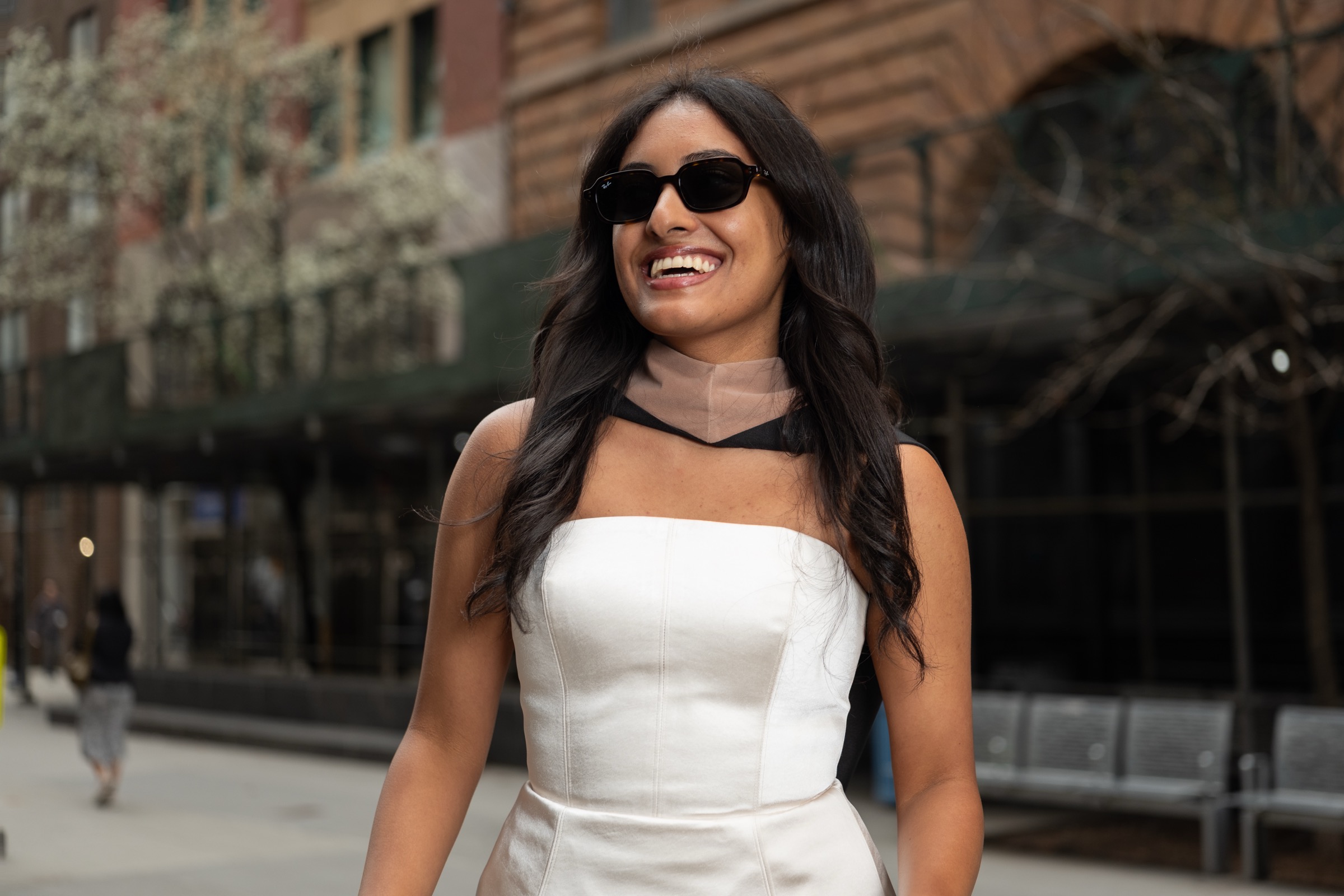 Sara walking through the city